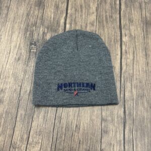 A grey beanie with the word northern on it.