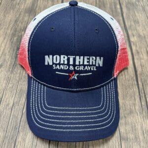 A blue hat with the words northern sand and gravel on it.
