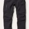 A black pair of pants hanging on the wall.