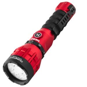 A red and black flashlight is on the floor.