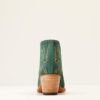 A back view of the heel of a pair of green boots.