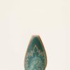 A green vase with a design on it