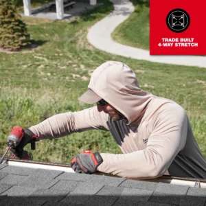 A man working on the roof of his home.