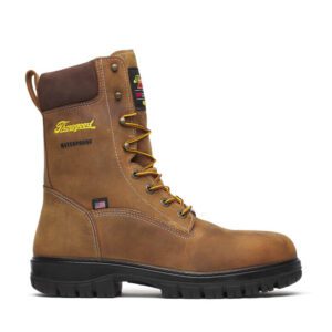 A pair of brown boots with black soles.