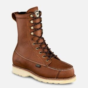 A pair of brown boots with laces on the side.