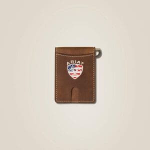 A brown leather wallet with an american flag on the front.