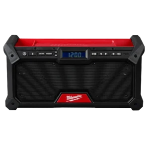 A red and black speaker with an alarm clock.