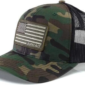 A camouflage hat with an american flag patch on it.