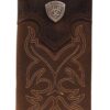 A brown wallet with a silver shield on it's front.