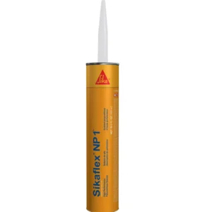 A yellow tube of glue is sitting on the floor.